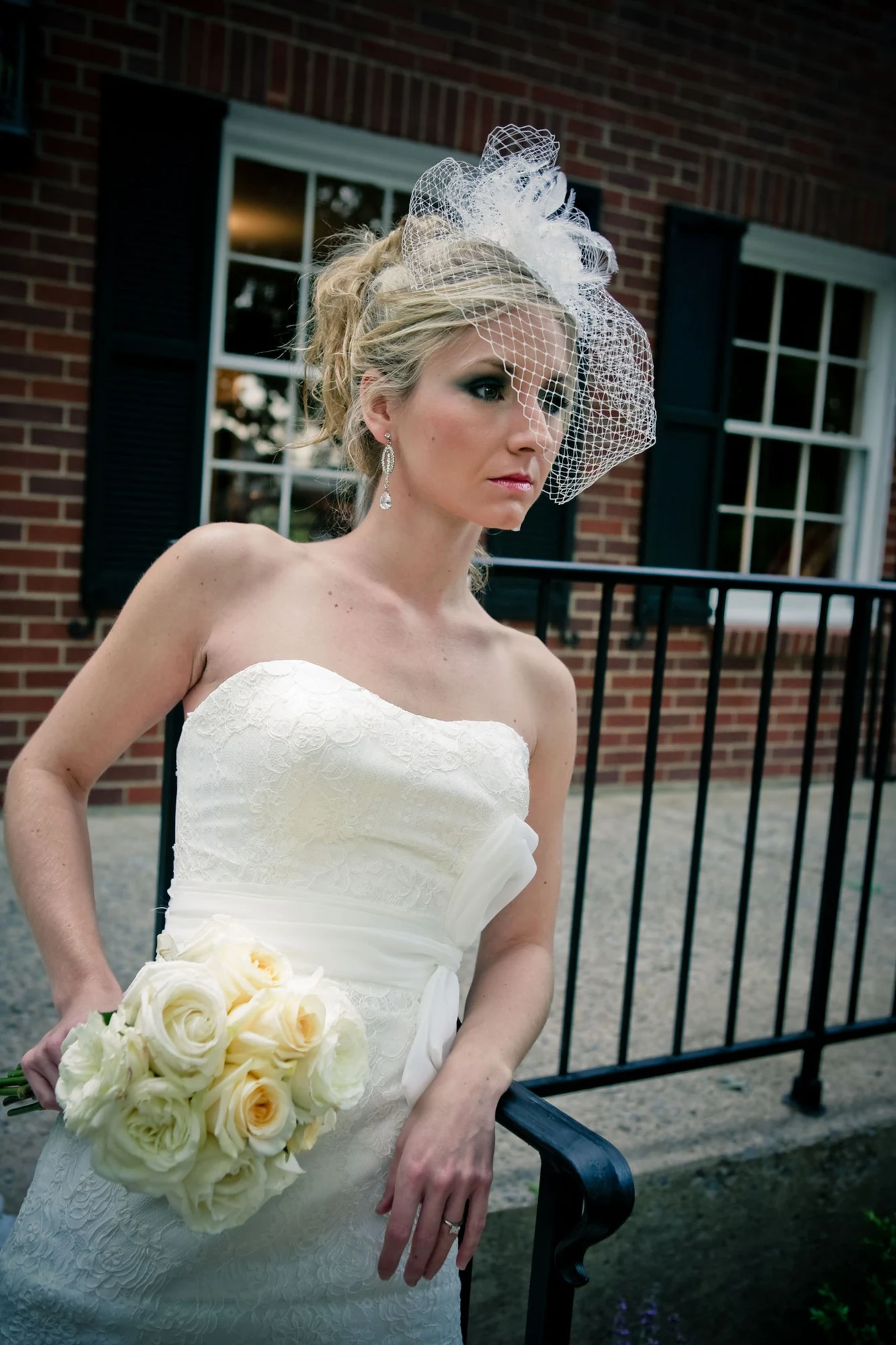 Bridal portrait photographed outdoors by a city building